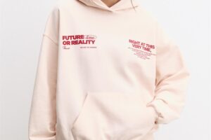 RED SWEATSHIRT WITH SLOGAN